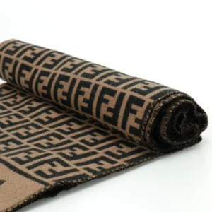 Fendi FD Old Flower Small FF Tassel Long Scarf rolled up, featuring a high-quality cashmere and wool blend with a distinctive FF logo pattern, showcasing its luxurious design and texture.