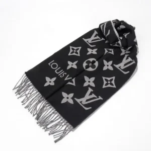 Louis Vuitton Printed Long Scarf in black and gray featuring iconic monogram pattern and fringe detailing, showcased as part of a full gift box set.