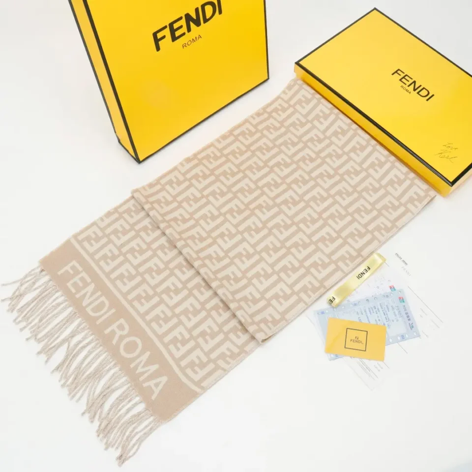 Fendi Roma scarf beige monogram pattern wool blend with fringe edges displayed with yellow branded box