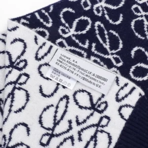 Loewe wool blend scarf navy blue white jacquard pattern made in UK with brand label close-up