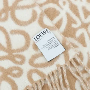 Loewe Double-Sided Floral Jacquard Wool Mohair Fringe Long Scarf label featuring brand name and care instructions, showcasing luxury designer accessory details.