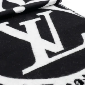 Louis Vuitton logo blanket black white wool material with fringed edges close-up detail