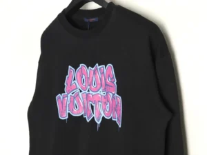 Louis Vuitton hoodie featuring colorful graffiti-style logo on a black background, showcasing streetwear aesthetics and luxury fashion appeal.