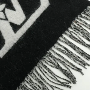 Louis Vuitton scarf black white wool fabric with fringe edges and monogram pattern