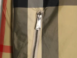 Burberry jacket beige black red nylon fabric metal zipper close-up detail