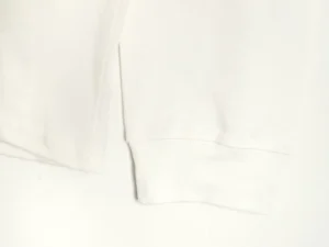Repsgoat long sleeve shirt white cotton material close-up of cuff stitching detail