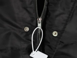 We11done jacket black nylon fabric with silver metal zipper and snap buttons close-up