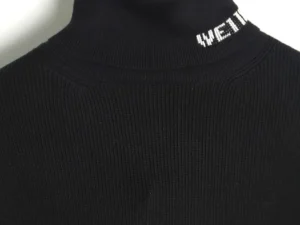Heron Preston turtleneck sweater black rib knit cotton blend with white branded collar text