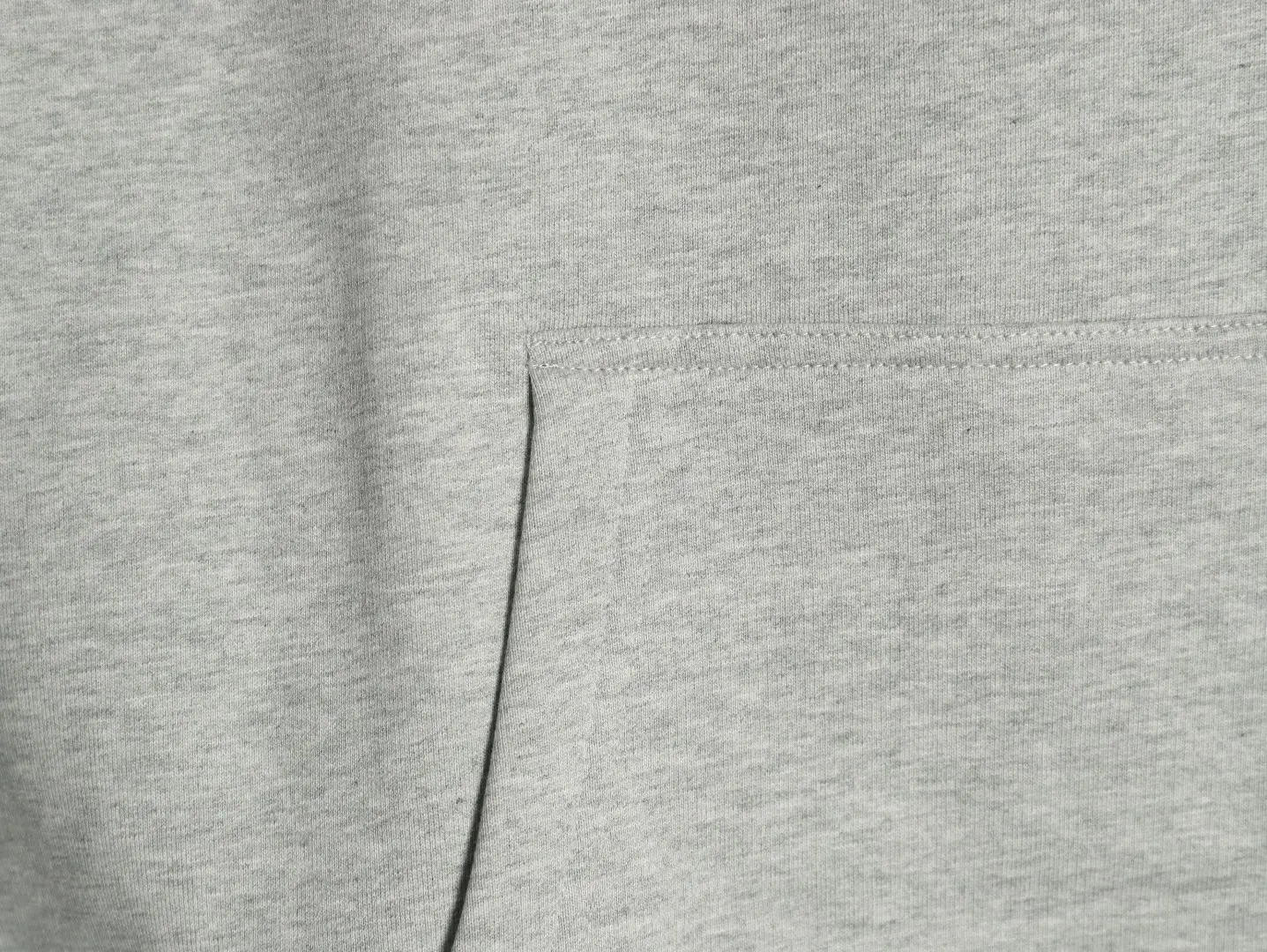 Repsgoat cotton fabric light grey material close-up showing detailed stitching and texture