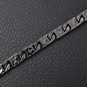 Louis Vuitton bracelet black metal chain with engraved monogram pattern accessory