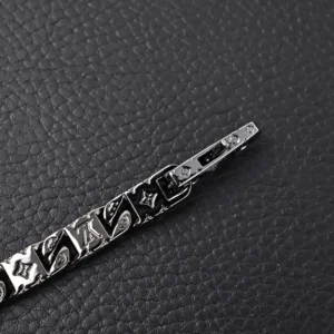 Louis Vuitton bracelet silver-tone metal with engraved monogram motifs accessory