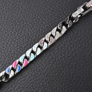 Louis Vuitton Chain Letter Embellished Colorful Hands bracelet featuring large flat chain links, vibrant enamel accents, and artificial crystals on a black leather background.