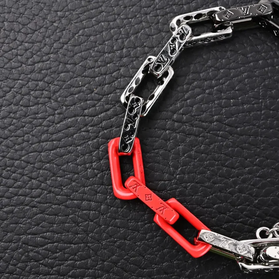 Louis Vuitton chain necklace silver metal and red resin links with LV logo detailing