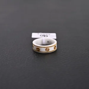 Gucci ring white ceramic gold-tone metal interlocking G logo band accessory
