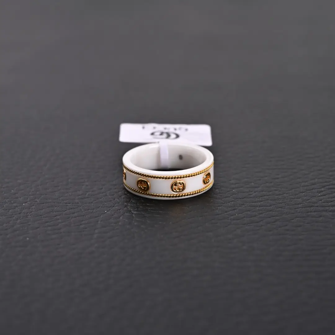 Gucci ring white ceramic gold-tone metal interlocking G logo band accessory