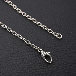 Gucci GUC 3D Double G Pure Silver Pendant Necklace featuring a sleek chain and distinctive pendant, suitable for both boys and girls, emphasizing luxury and elegance.