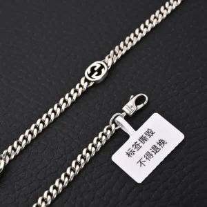 Gucci Cuban link chain silver metal necklace with interlocking G detail and lobster clasp closure