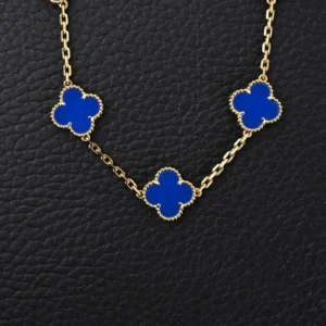 Van Cleef & Arpels Alhambra necklace yellow gold blue agate clover motifs delicate chain accessory