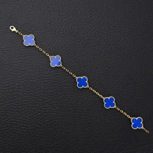 Van Cleef & Arpels Alhambra bracelet blue enamel yellow gold chain luxury accessory