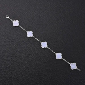 Van Cleef & Arpels Blue Jadeite Bracelet featuring smooth four-leaf petal shapes, crafted with S925 silver and thick plated 18K gold, showcasing elegant design and unique craftsmanship.