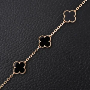Van Cleef & Arpels Alhambra bracelet rose gold black onyx clover chain accessory