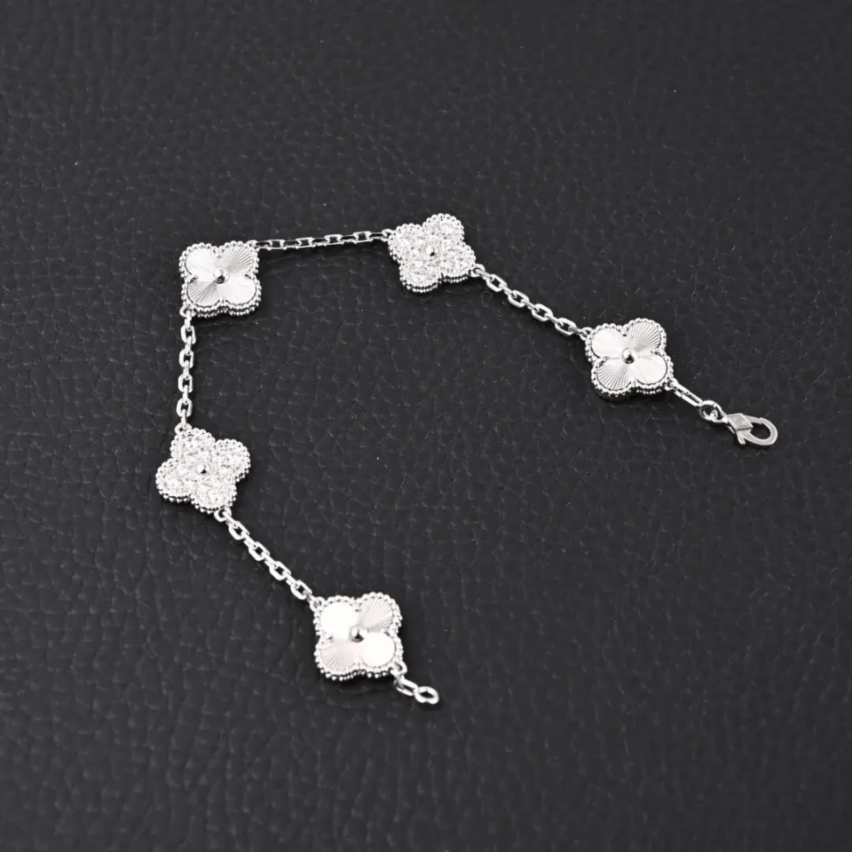 Van Cleef & Arpels Alhambra bracelet white gold clover motifs delicate chain accessory