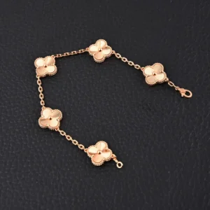 Van Cleef & Arpels Alhambra bracelet rose gold floral motifs chain accessory