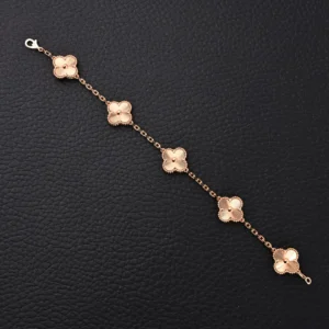 Van Cleef & Arpels Alhambra bracelet rose gold floral motifs delicate chain accessory