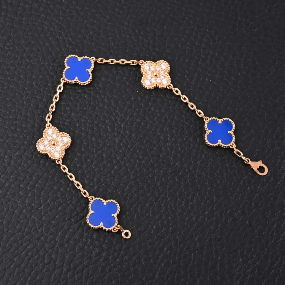 Van Cleef & Arpels Alhambra bracelet blue lapis lazuli and diamond clover motifs rose gold chain accessory