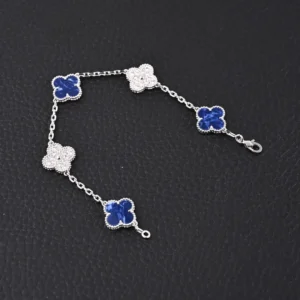 Van Cleef & Arpels Alhambra bracelet white gold blue lapis lazuli four-leaf clover motifs