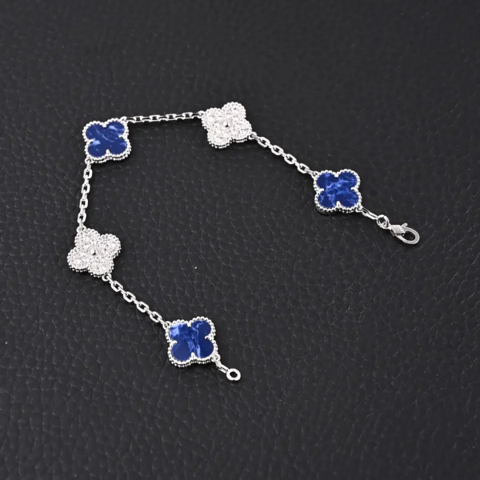 Van Cleef & Arpels Alhambra bracelet white gold blue lapis lazuli four-leaf clover motifs