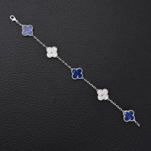 Van Cleef & Arpels Alhambra bracelet blue lapis lazuli clover motifs white gold chain accessory