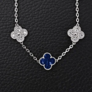 Van Cleef & Arpels Alhambra necklace silver chain blue lapis lazuli and diamond flower motifs
