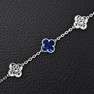 Van Cleef & Arpels Alhambra bracelet silver with blue lapis lazuli and ornate clover motifs