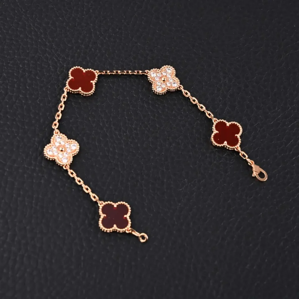 Van Cleef & Arpels Alhambra bracelet pink gold red carnelian and diamond accents