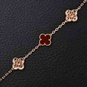 Van Cleef & Arpels Alhambra bracelet rose gold red agate clover motif delicate chain accessory