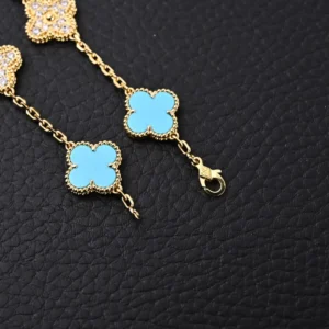 Van Cleef & Arpels Alhambra bracelet turquoise clover gold chain with diamond accents accessory