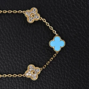 Van Cleef & Arpels Alhambra bracelet yellow gold turquoise enamel diamond flower motifs