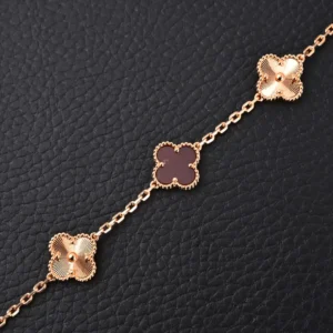 Van Cleef & Arpels Alhambra bracelet rose gold brown clover motifs chain accessory