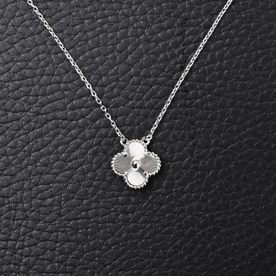 Van Cleef & Arpels Alhambra pendant necklace silver clover-shaped delicate chain accessory