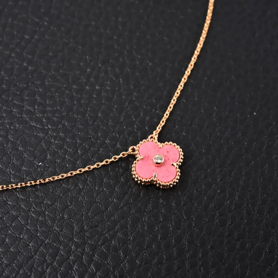 Van Cleef & Arpels Alhambra necklace pink mother-of-pearl clover rose gold chain with diamond center