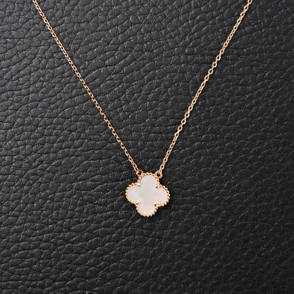Van Cleef & Arpels Alhambra necklace white mother of pearl clover pendant rose gold chain accessory