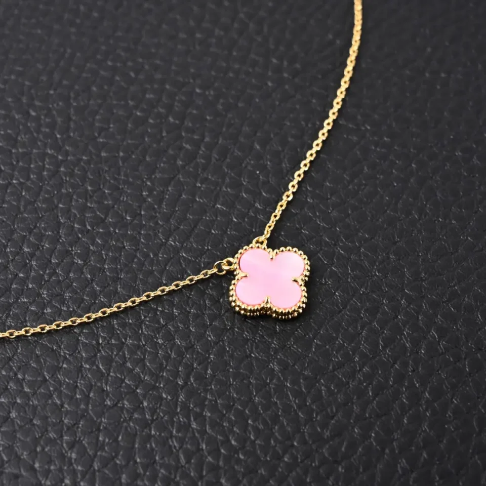 Van Cleef & Arpels Alhambra necklace pink mother-of-pearl gold chain delicate floral pendant accessory