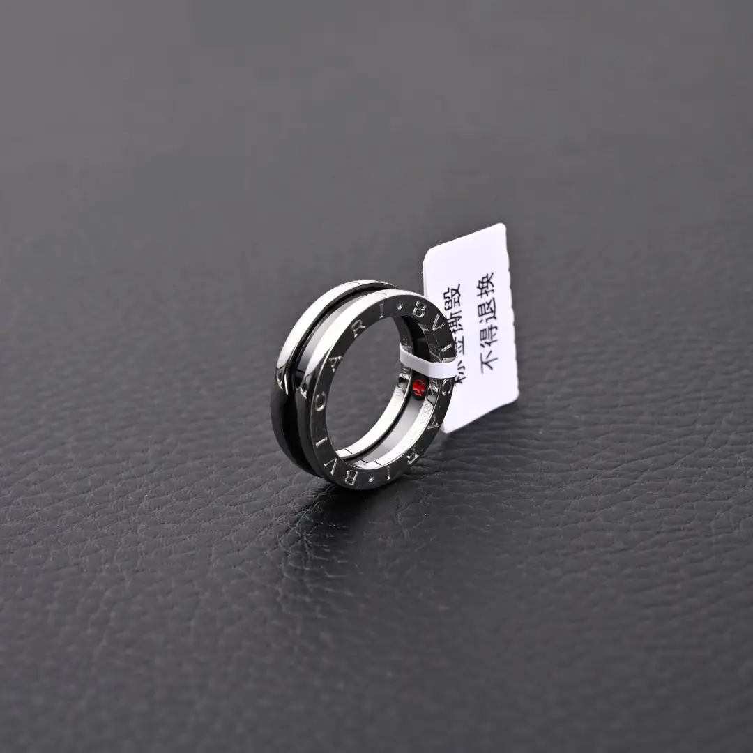 Bvlgari B.zero1 ring silver stainless steel black resin band with engraved logo design