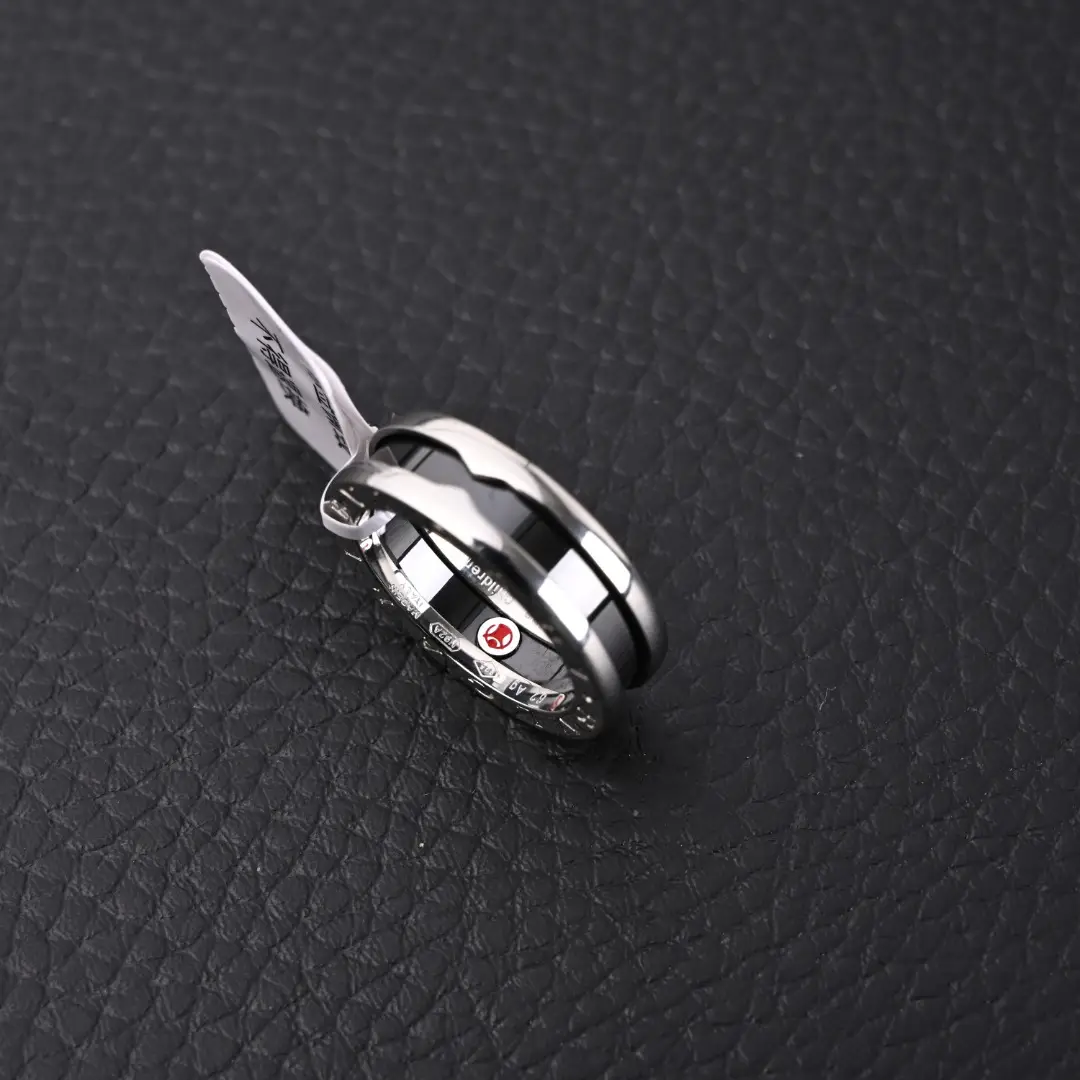 Cartier ring white and black ceramic stainless steel band with curved design