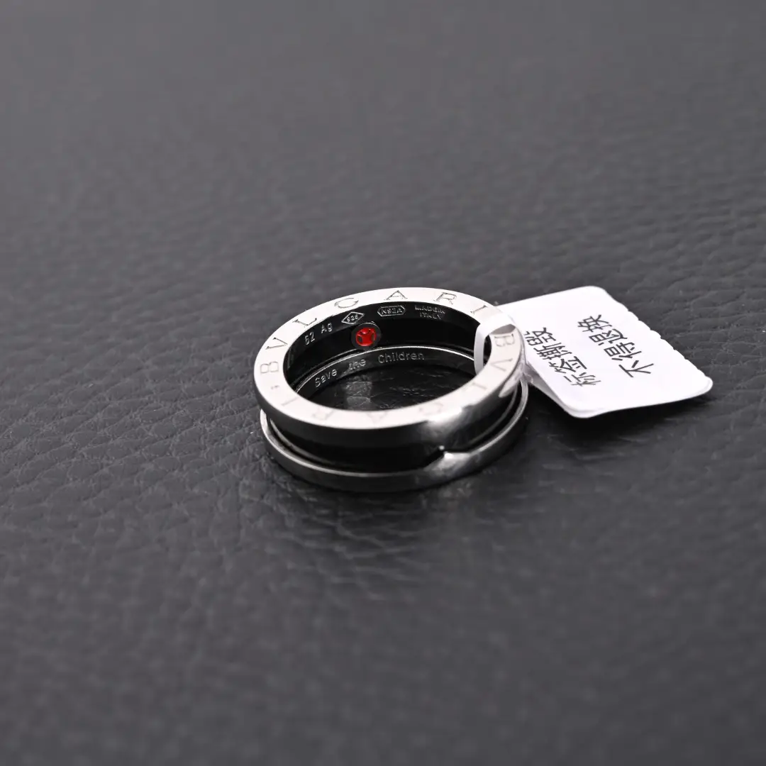 Bvlgari B.zero1 ring silver stainless steel with engraved logo and red accent inside band