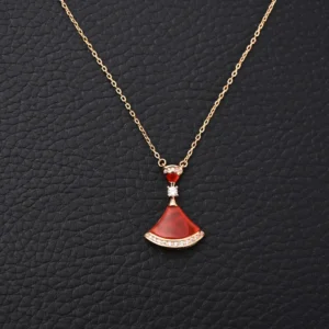 Tiffany & Co. pendant necklace red gemstone rose gold chain with diamond accents luxury accessory