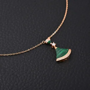 Unknown brand necklace green stone gold chain pendant with crystal accents