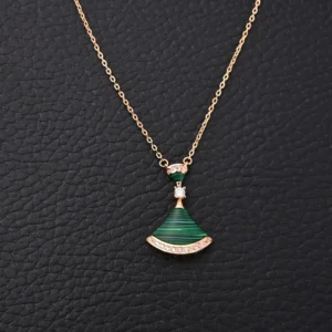 Tiffany & Co. pendant necklace green malachite gold chain with diamond accents luxury accessory