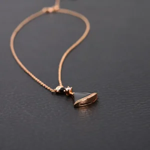 RepsGoat necklace black pendant rose gold chain elegant jewelry accessory with crystal accents